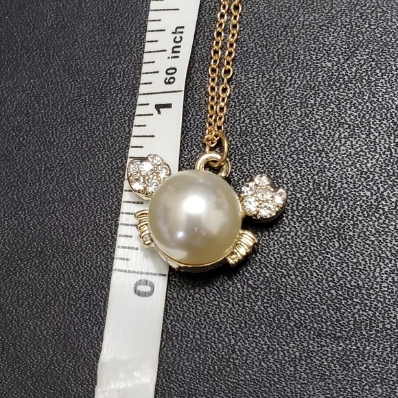 **Final Sale** Gold tone faux pearl crab necklace - Picture 6 of 8